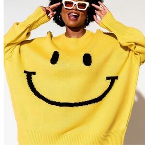 Lala sweater, yellow oversized happy face! Size small/medium, oversize